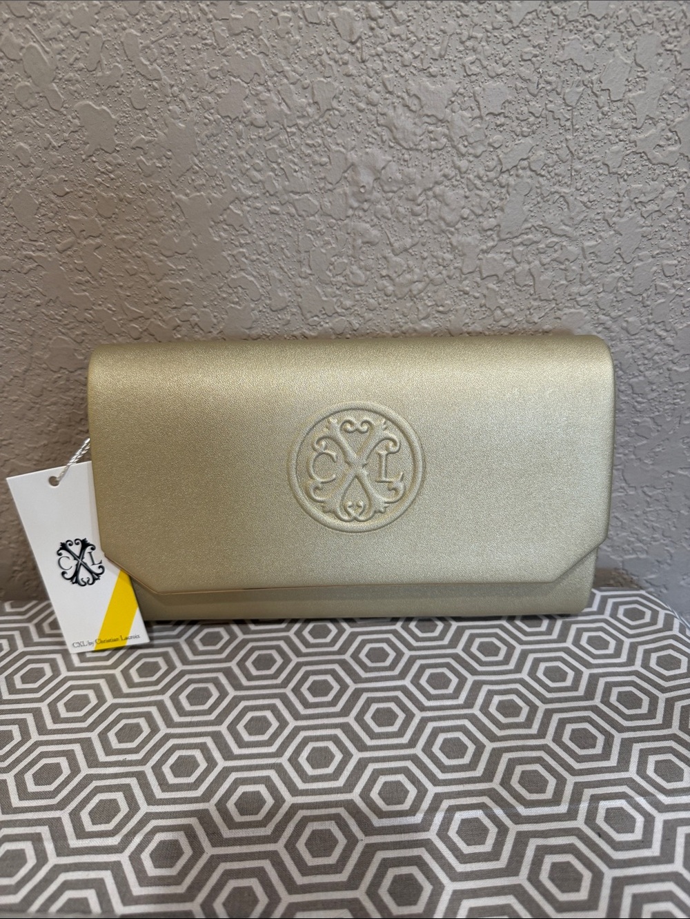 Christian Lacroix Metallic Gold Embossed Logo Clutch